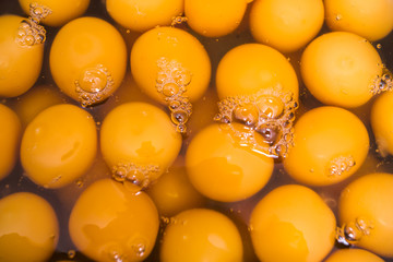 yolks made bread in a stainless steel container.