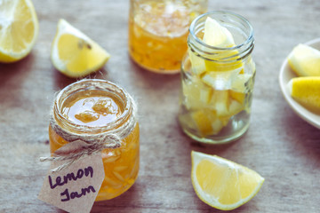 Homemade lemon jam in glass jar. Organic fresh yellow jam
