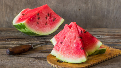 Watermelon on the wooden background. Organic watermelon