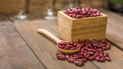 Red bean in the box on the wood background