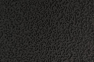 Fototapeta premium Pattern of black cylinders of different length