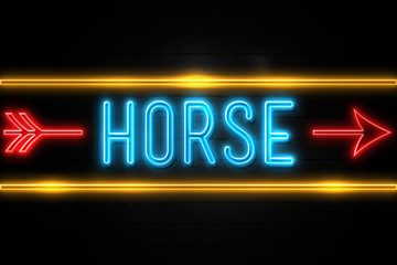 Fototapeta premium Horse - fluorescent Neon Sign on brickwall Front view
