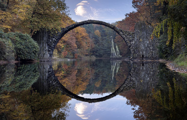 Devil's bridge in Kromlau in autumn coat