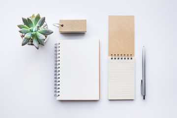 Business table top with mock up office supplies on white background.Flat lay.Copy space.