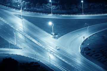 closeup of the light trails on grade separation bridge