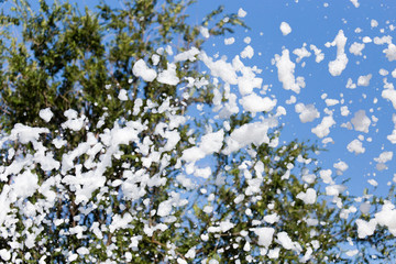 White foam at the festival as a background