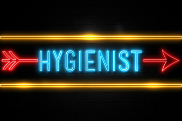 Hygienist  - fluorescent Neon Sign on brickwall Front view