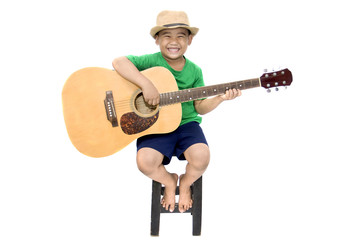 asian boy playing guitar on isolated white background