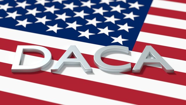 The word daca on an american flag immigration concept