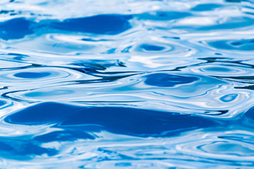 Naklejka premium The smooth water in the pool as a background