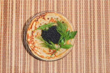 Pancakes with black  caviar