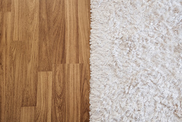 Close-up luxury white carpet on laminate wood floor in living room, interior decoration - 170389298