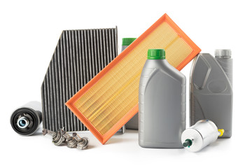 Car oil filters and motor oil can isolated on white