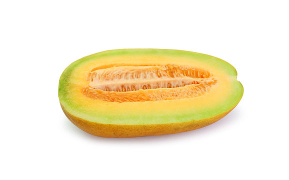 Cantaloupe melon cut in half looking healthy and delicious, isolated on white.
