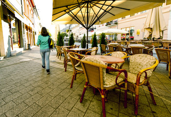 Young girl enjoying downtown in  morning