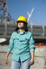 Obraz na płótnie Canvas Girl student practice on a construction site