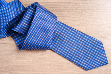 Men's accessories men's shoes, tie on a wooden background. Classic men's accessories. Top view