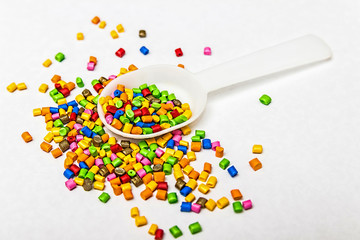 Polymeric dye. Colorant for plastics. Pigment in the granules.