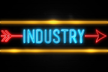 Industry  - fluorescent Neon Sign on brickwall Front view