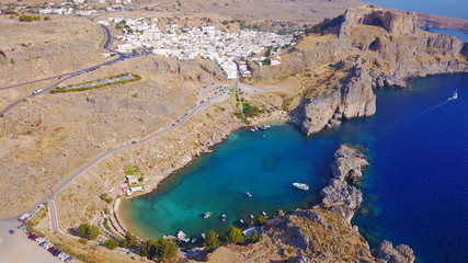 Fototapeta na wymiar Aerial drone photo of iconic ancient Acropolis and village of Lindos, Rodos island, Aegean, Dodecanese, Greece