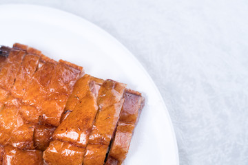 nice serving of bbq ribs on cutting board