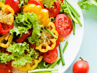 Red-yellow tomatoes salad