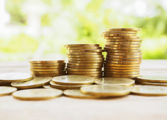 stack of money, rows of coins for finance and banking concept