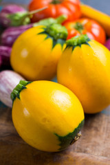 Fresh organic vegetables - round courgette, small eggplants, tomatoes, diet concept, Italian and French food, healthy food.