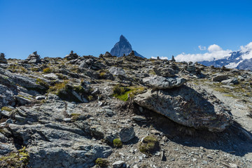 Scenic view of Matterhorn between rocks, Swiss Alps, Switzerland