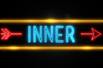 Inner  - fluorescent Neon Sign on brickwall Front view