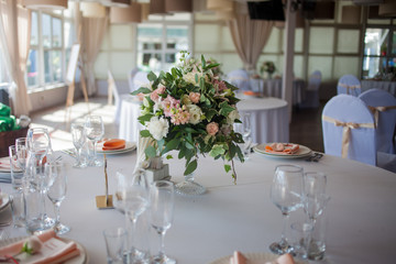 Wedding decor. Flowers in the restaurant, table setting