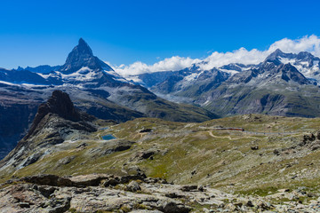 Fototapeta na wymiar Matterhorn, Riffelsee and Gornergrat train, Swiss Alps, Switzerland