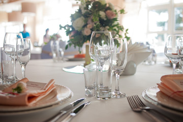 Wedding decor. Flowers in the restaurant, table setting
