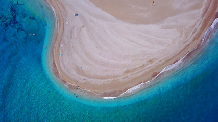August 2017: Aerial drone photo of Rodos town peninsula with famous resorts and turquoise clear waters, Rhodes island, Aegean, Dodecanese, Greece