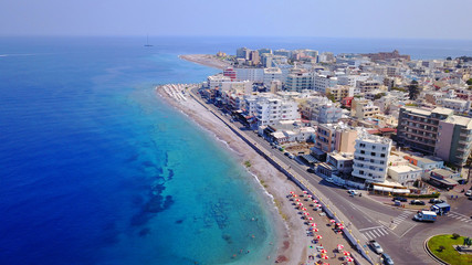 Fototapeta na wymiar August 2017: Aerial drone photo of Rodos town peninsula with famous resorts and turquoise clear waters, Rhodes island, Aegean, Dodecanese, Greece