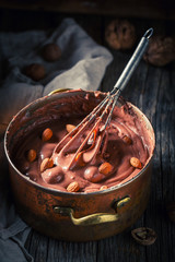 Delicious chocolate with hazelnuts, almonds and walnuts