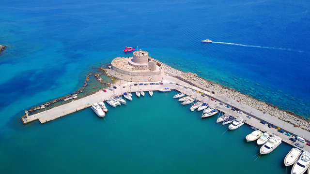 August 2017: Aerial drone photo of iconic medieval fortress of St. Nicholas in port entrance of Rodos island, Aegean, Dodecanese, Greece