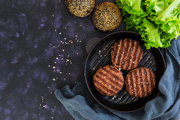 Ingredients for burger. Beef meat cooked on the grill