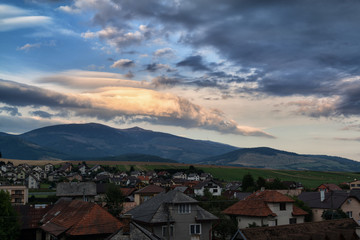 Fototapeta premium Amazing sunset clouds in the mountains