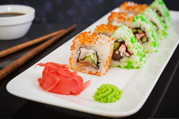 Sushi roll on dark background