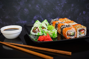Sushi roll on dark background