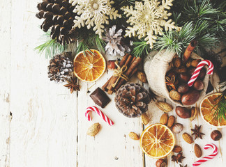 New Year or Christmas composition with walnuts, mulled wine, hazelnuts