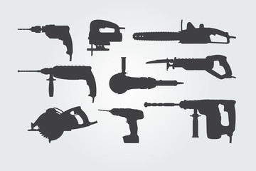 Set of hand power tools. Vector silhouettes.