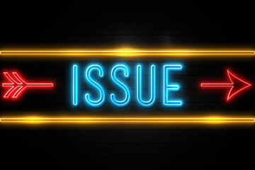 Fototapeta premium Issue - fluorescent Neon Sign on brickwall Front view