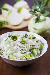Salad with kohlrabi, cucumber and dill.