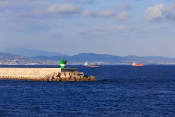 Fototapeta premium Freighters and Seawall in Barcelona