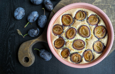 Rustic homemade pie with plums.