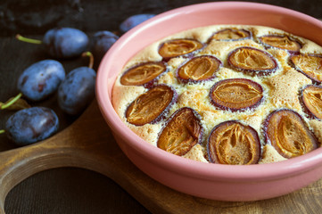 Rustic homemade pie with plums.