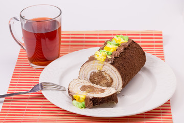 cake on plate and Cup of tea