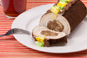 cake on plate and Cup of tea